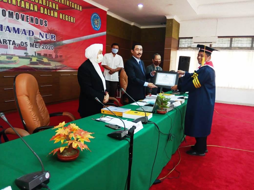 Dr. Drs, Muhamad Nur, ME. CRGP Resmi Menyandang Gelar Doktor