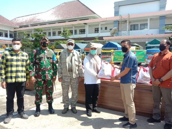 Distribusi Bantuan dan Revitalisasi Fasilitas Publik 1