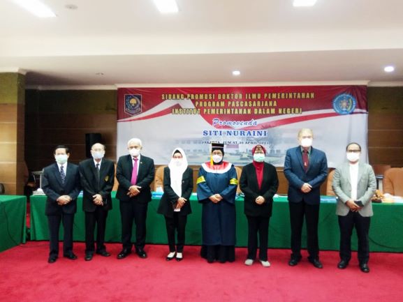 Dr. Dra, Hj. Siti Nuraini, M.Si. 6